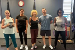 Person journaling with motivational quotes, illustrating mindset traits for fitness motivation